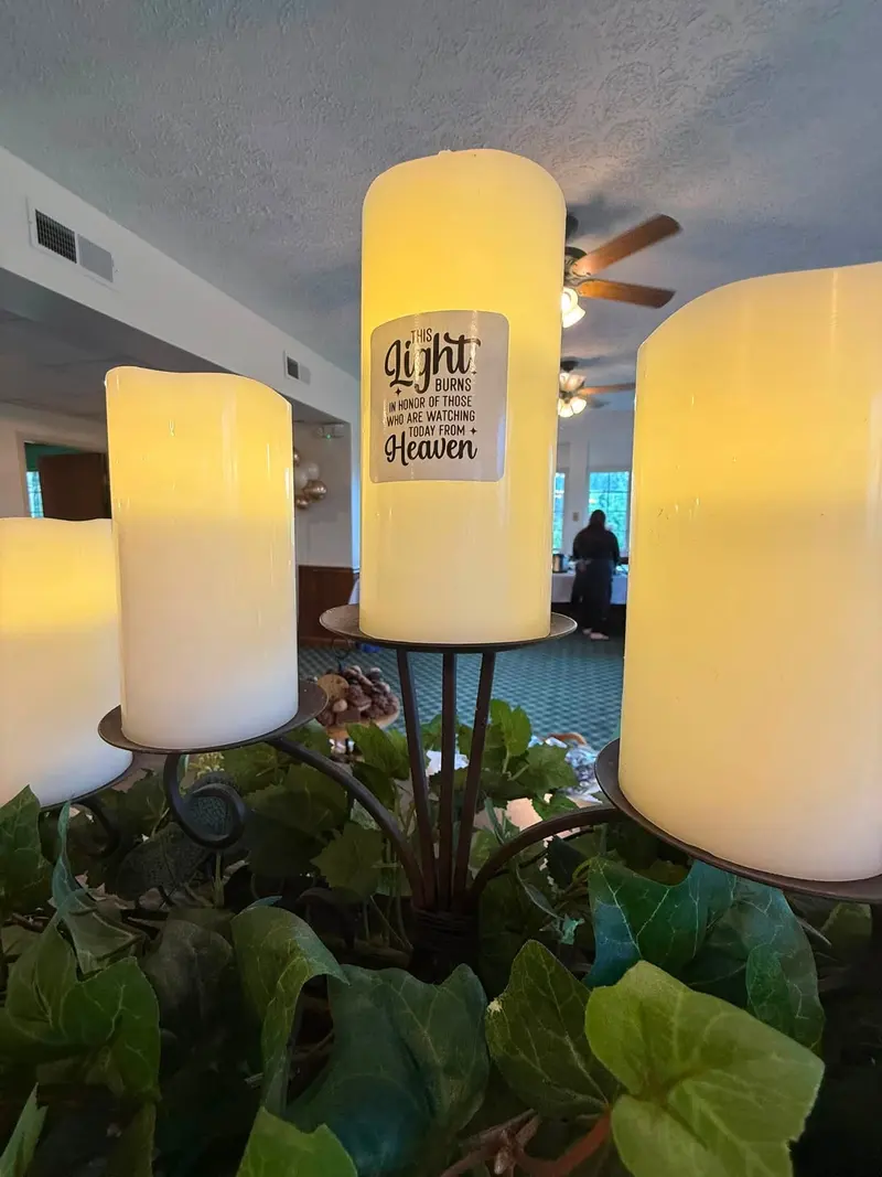Warm memorial candle display prepared for a special celebration